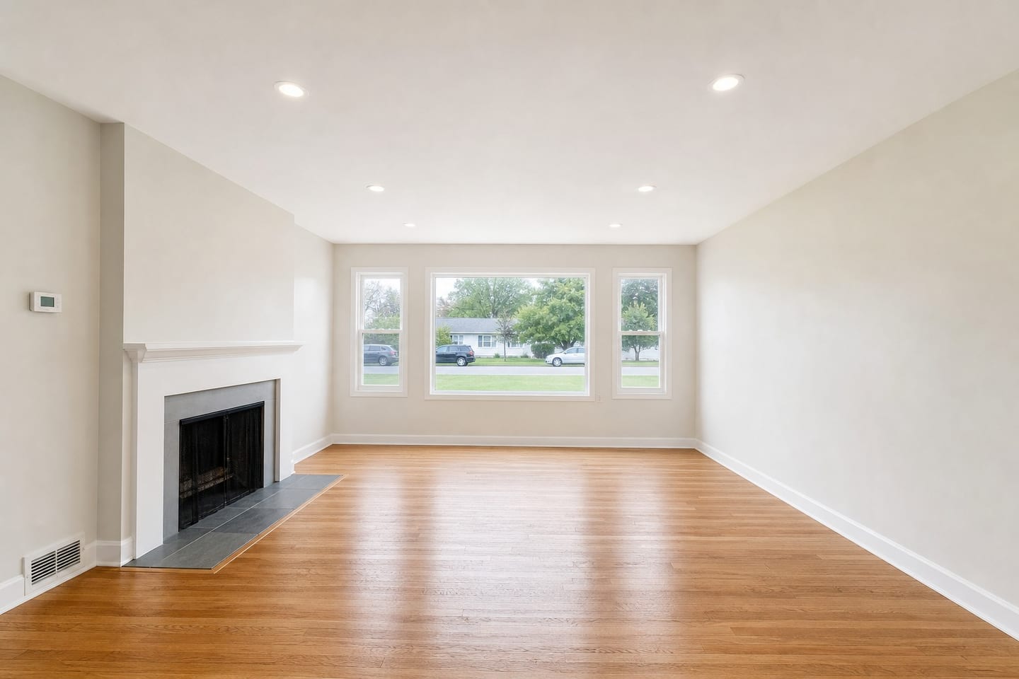 Empty Living room shown before and after virtual staging in a Scandinavian scheme — before
